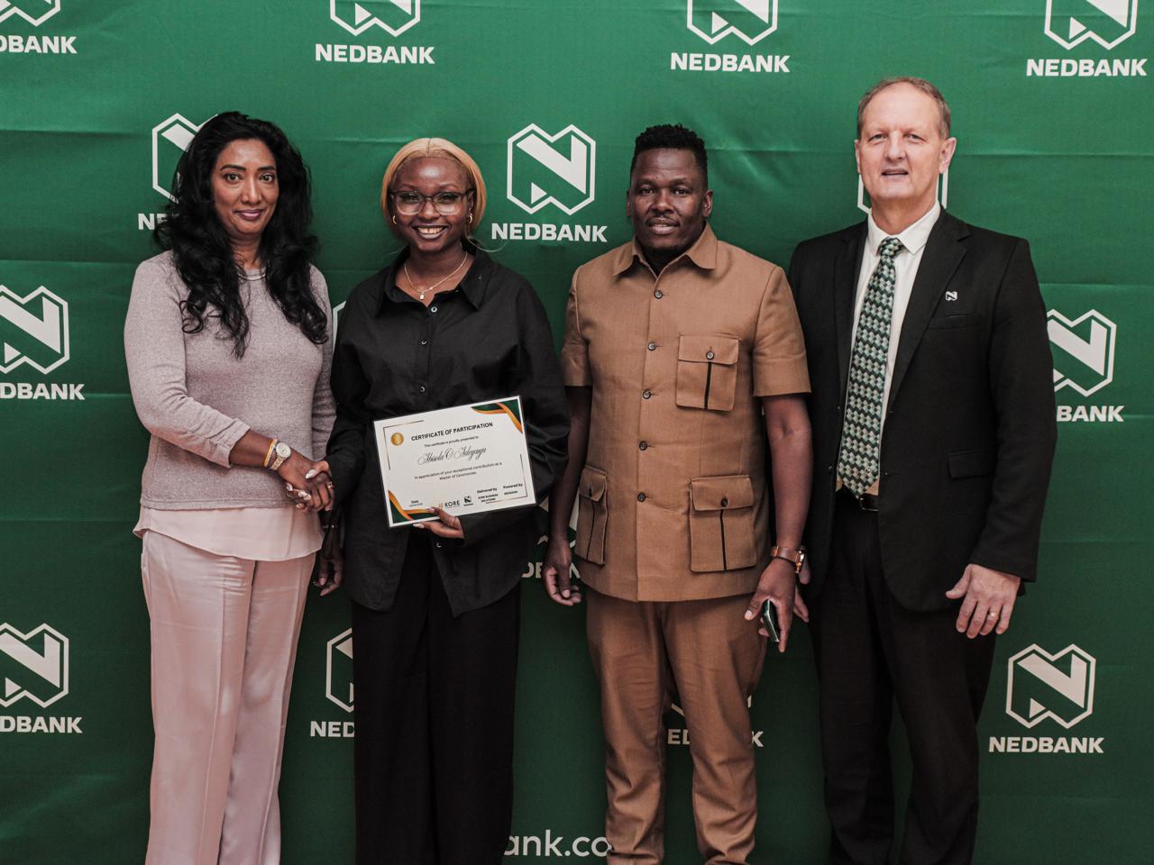 Lynxio Tech co-founder receiving a certificate at a Nedbank and Kore programme